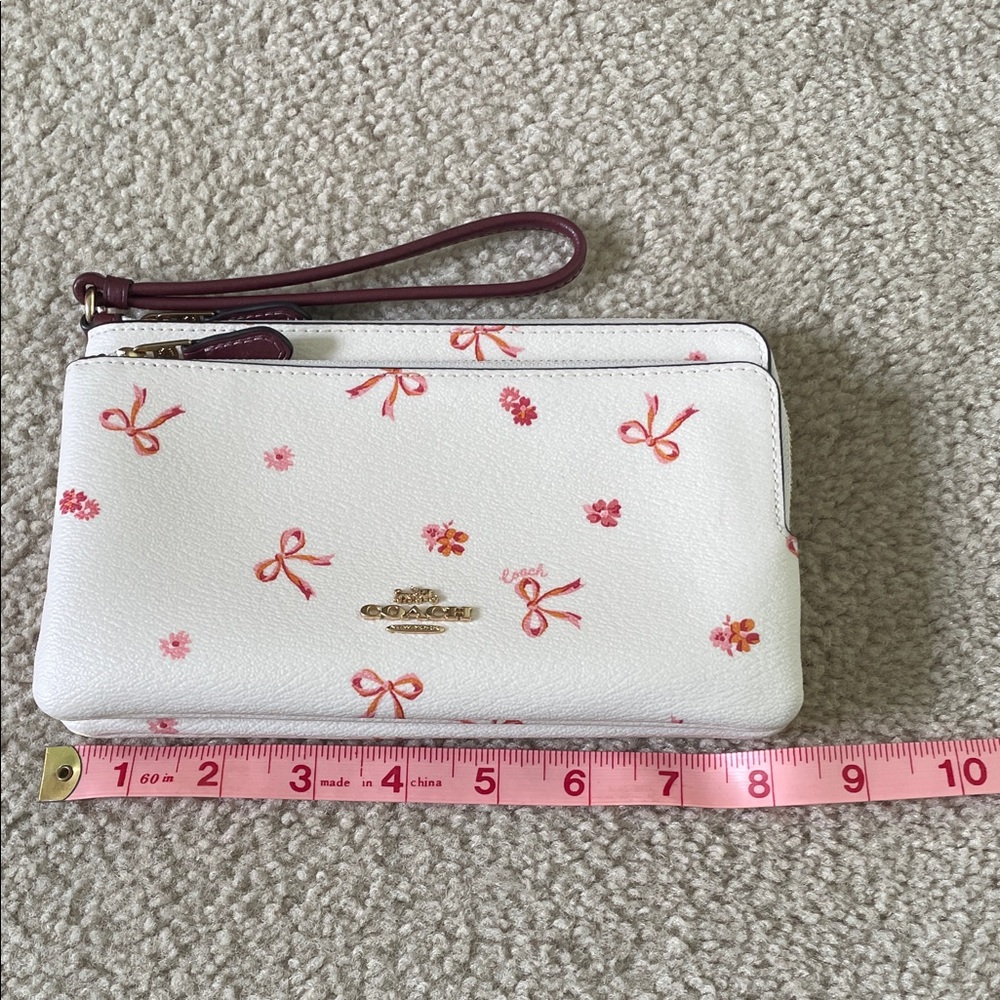 Coach White Wristlet with Pink Floral Pattern